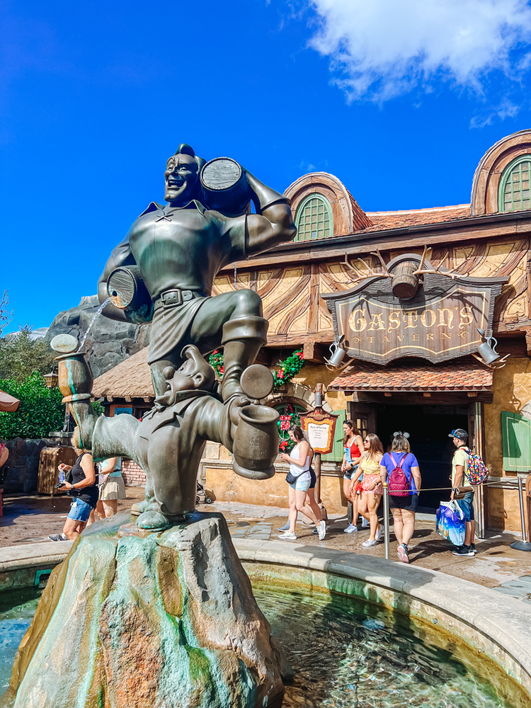 Gaston's Tavern statue at Magic Kingdom